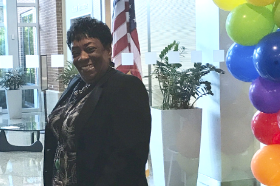 Cigna employee posing for a photo at one of our Employee Resource Group events.