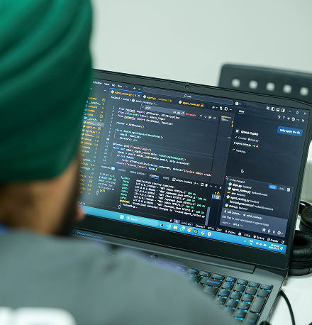 A laptop screen showing a participant's work on VS Code