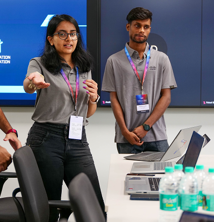 A team presenting their findings to a larger group