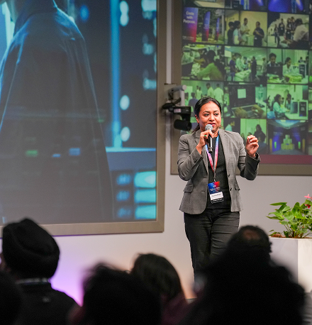 A program instructor presenting to a wider audience