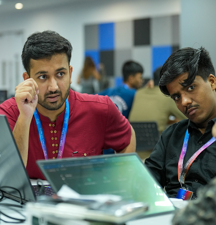 Two participants working together to complete the program