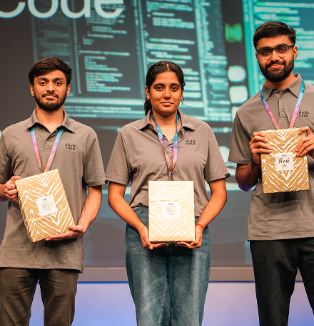 Participants on stage receiving their awards