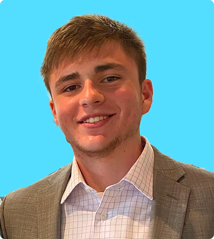 Connor smiles directly at the camera.