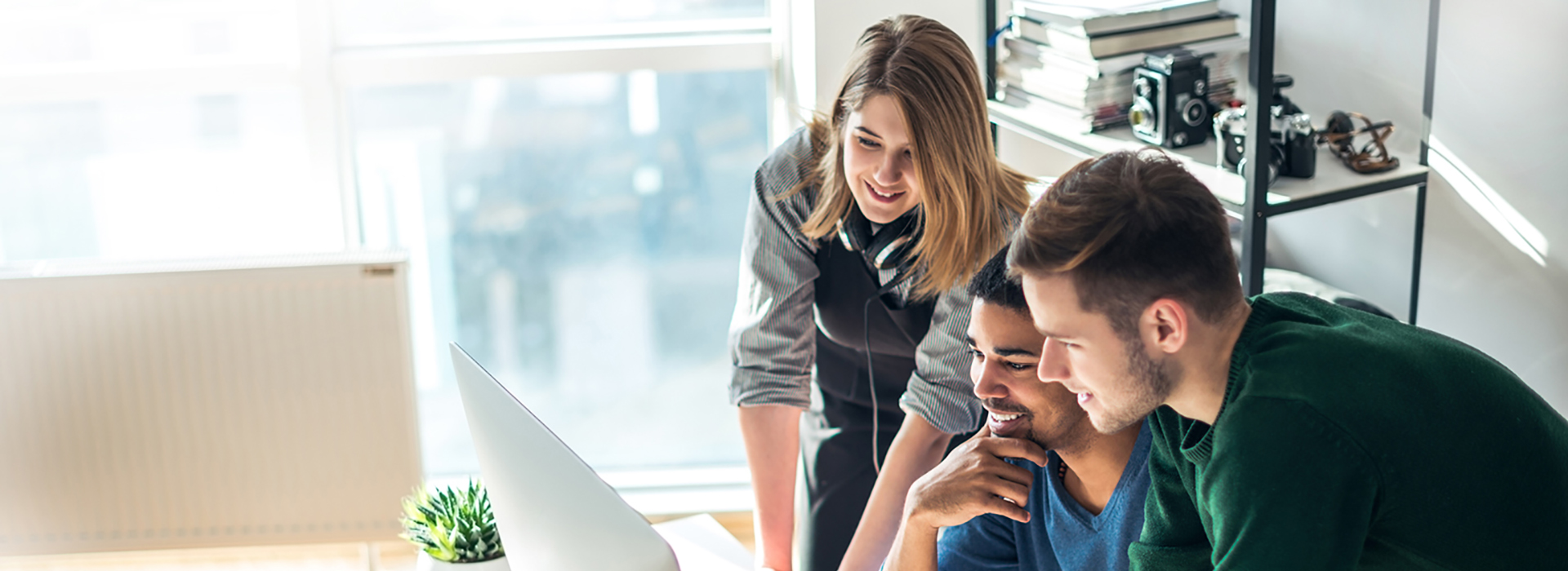 Team working on a project together in an office