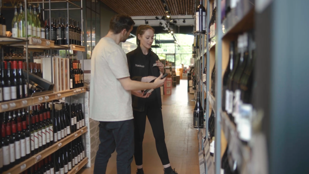 male and female store managers working at vintage cellars stores