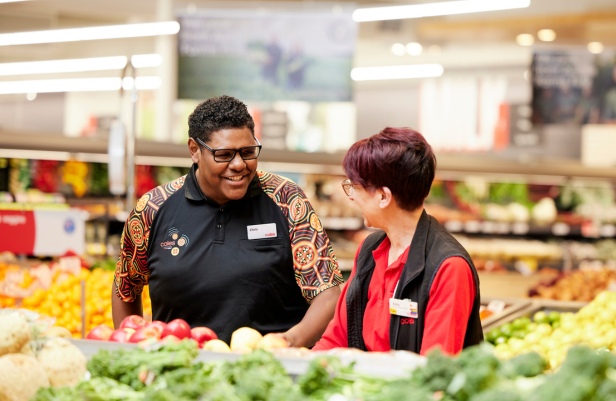 Aboriginal Coles team member in a supermarket