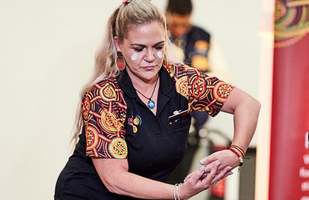 Aboriginal woman dancing 