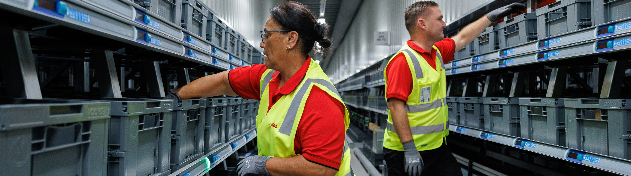 Male and female team members working at the ADC doing a pick