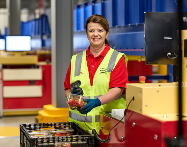 Female team member working inside a Customer Fulfillment Centre