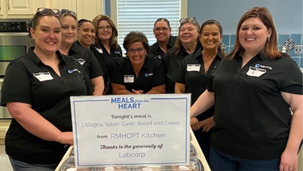 Labcorp employees volunteering at a community event.
