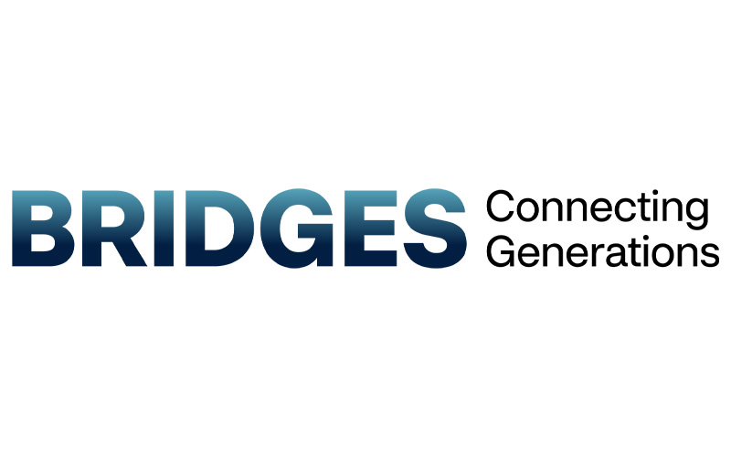 The image shows the logo for "Bridges Connecting Generations." The word "BRIDGES" is in bold, blue gradient text, while "Connecting Generations" is written in black regular font on the right side of "BRIDGES." The background is white.