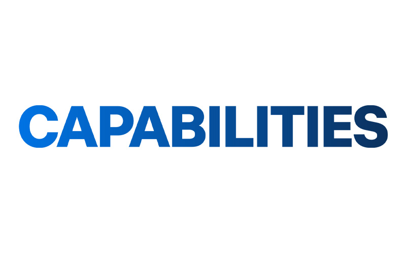 The word "CAPABILITIES" is written in bold, uppercase letters. The text starts with a light blue color on the left and transitions to a dark blue color on the right, creating a gradient effect. The background is white.