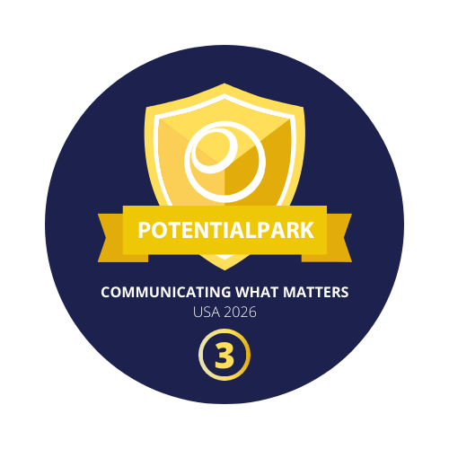 Circular badge on a dark navy background featuring a gold shield emblem with a cube icon at the center. A gold ribbon across the shield reads “POTENTIALPARK,” with white text below saying “COMMUNICATING WHAT MATTERS” and “USA 2026.” A small gold circle at the bottom contains the number “3.”