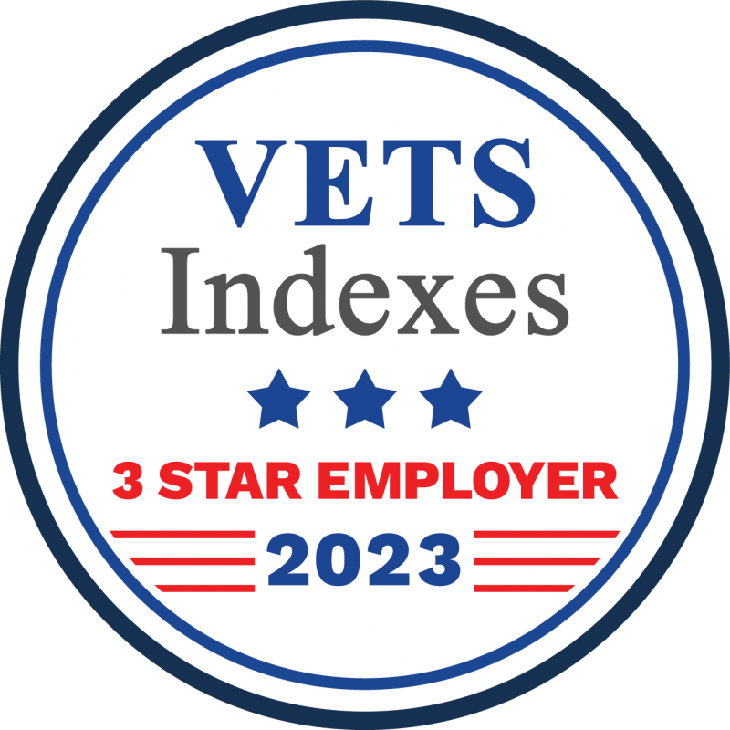 A circular badge with "VETS Indexes" at the top, three stars in the middle, and "3 Star Employer" below in red text. The year "2023" is displayed at the bottom with red stripes flanking it. The outer border of the badge is blue.