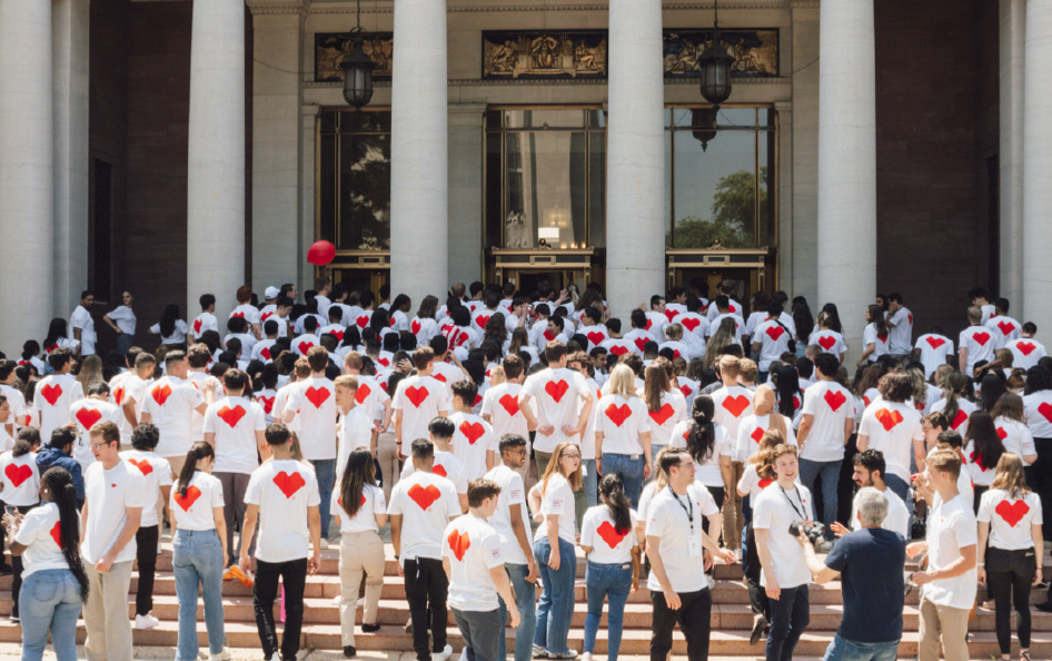 Interns with white shirts that display cvs health heart logo