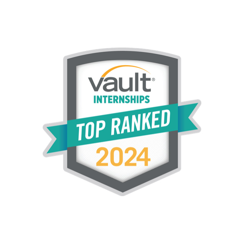 Badge icon with a gray shield and green banner, displaying the text "vault INTERNSHIPS" at the top, "TOP RANKED" on the green banner, and "2024" at the bottom.