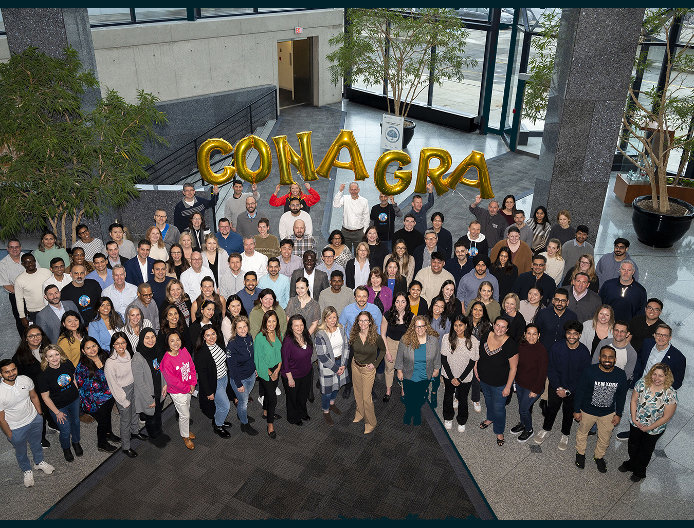 Large group photo in the new Mississauga office. 