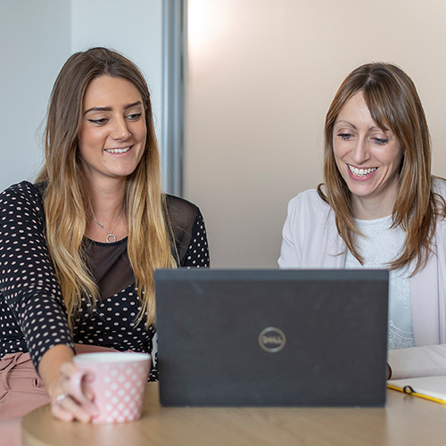 Photograph of LINX associates in office