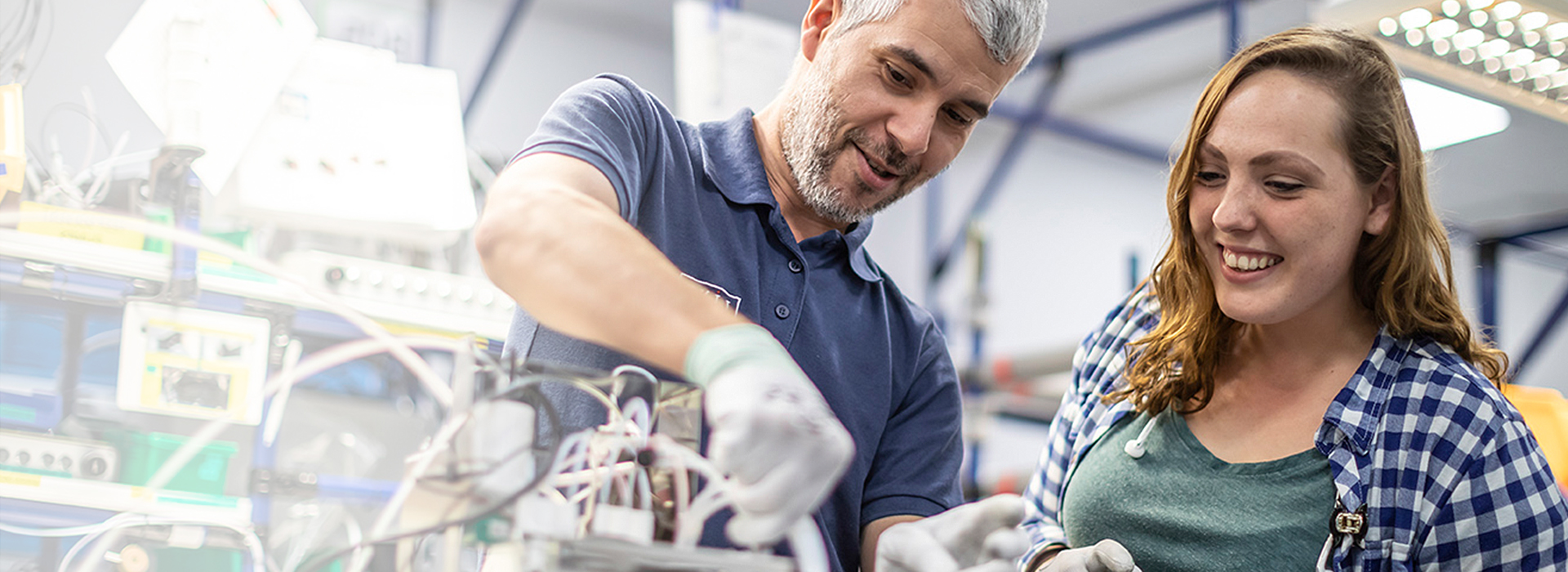 Photograph of LINX associates working in factory