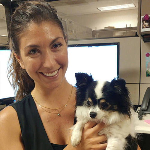 Photograph of Molecular Devices associate with a dog