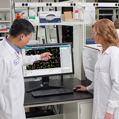 Photograph of Molecular Devices associates in a lab