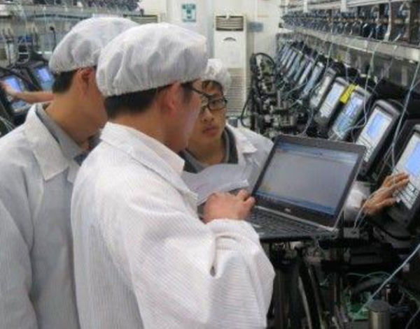 Photograph of Videojet associates in factory