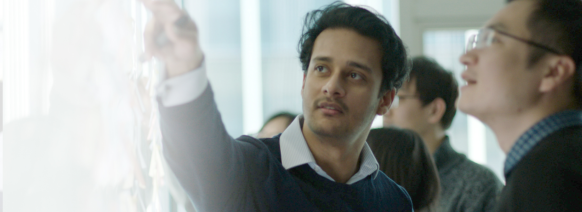 Photograph of Radiometer associates in meeting