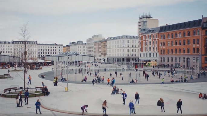 People walking in city square
