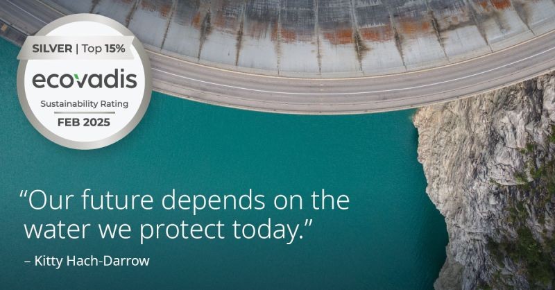 An aerial shot of a water treatment facility with the Ecovadis silver badge and text with the Kitty Hach-Darrow quote "Our future depends on the water we protect today"