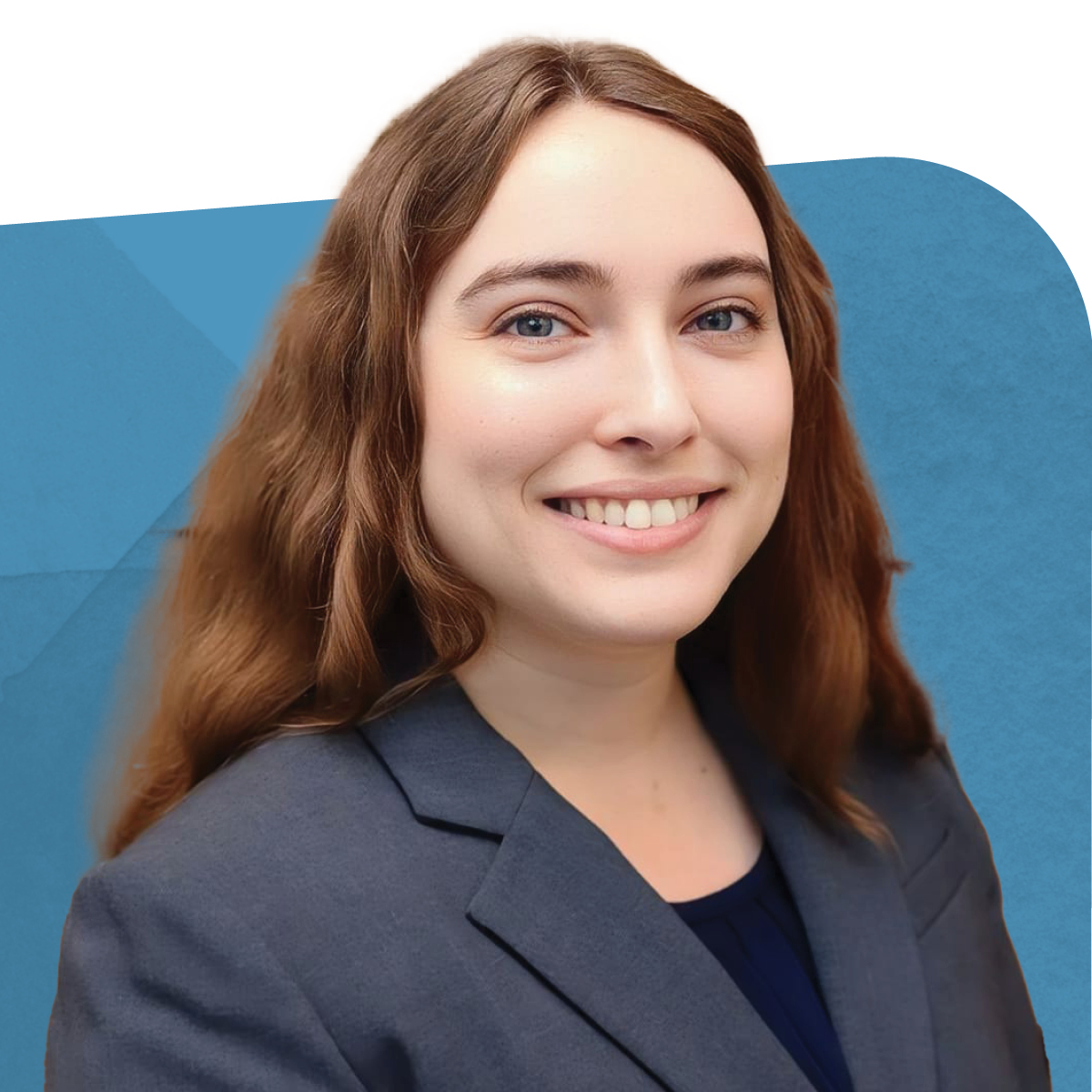 Alex Corrigan, Senior Chemist, R&D at ChemTreat, smiling against a blue background