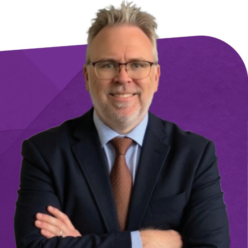 Jimmy Rousseau, District Sales Manager at Trojan Technologies, smiling against a purple background