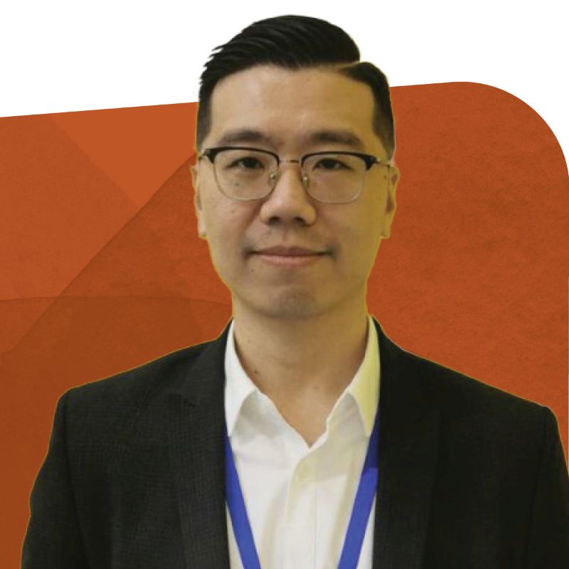 Denny Wang, Technical Sales Manager at Videojet, against an orange background