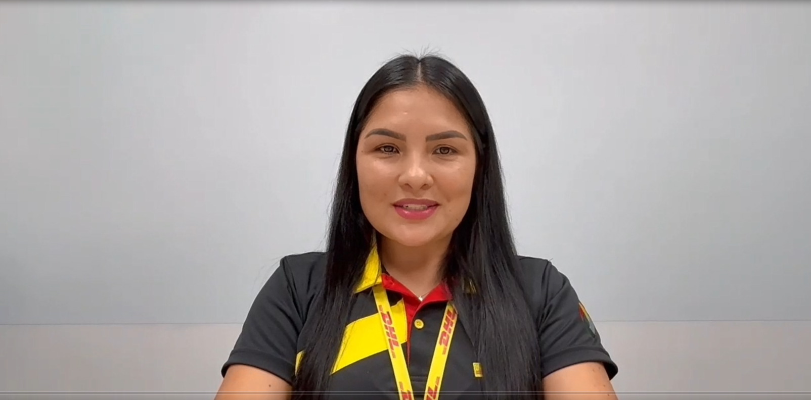 A DHL employee documenting the interview.