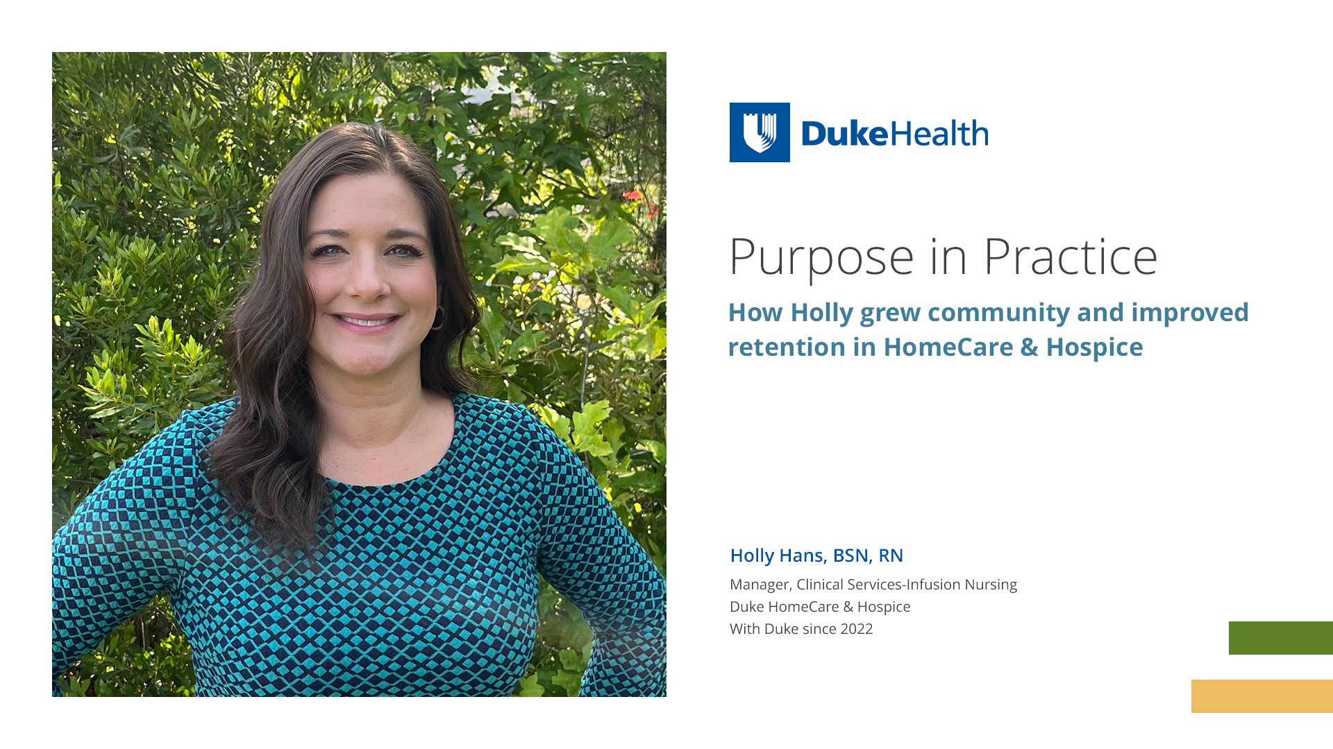 Holly smiles in a patterned shirt