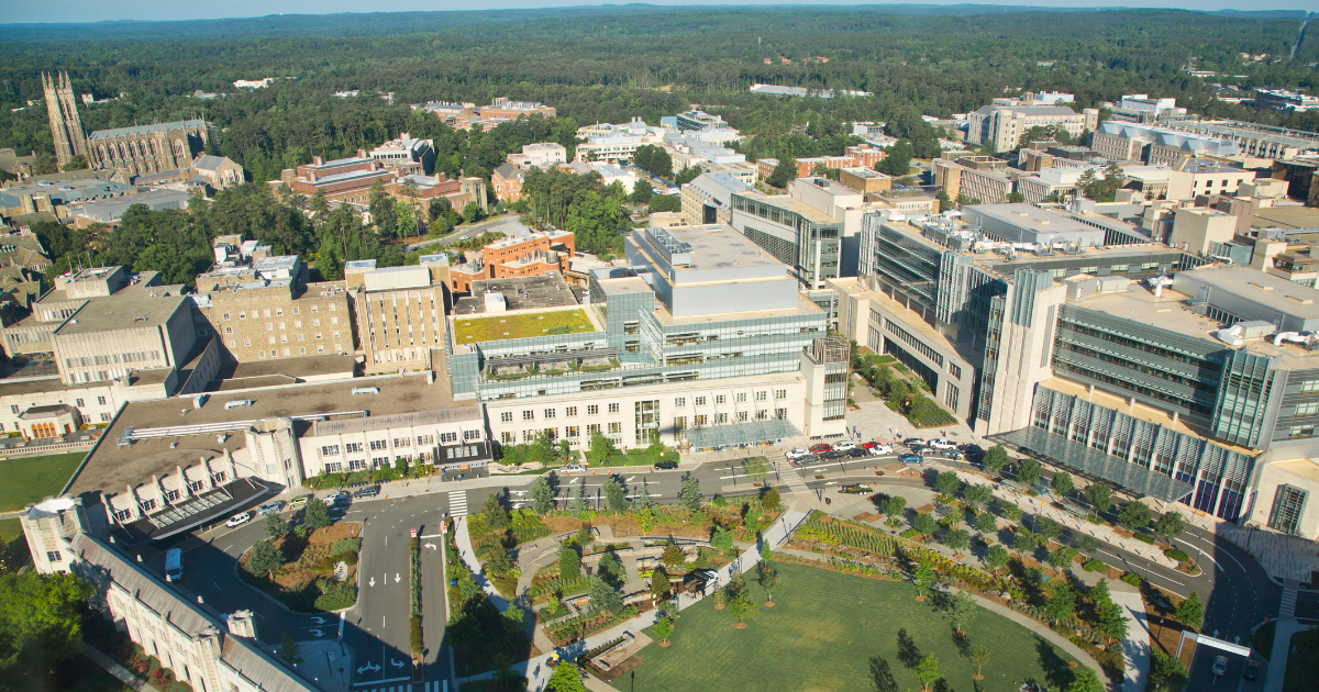 Aerial view of Duke University Hospital with the iconic Duke chapel in the background.