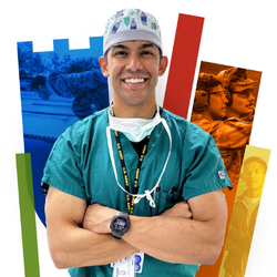 Male nurse smiles in scrubs with a colorful Duke Health shield behind him.