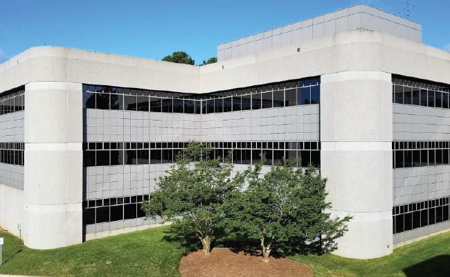 Sunny blue sky above the Duke Health Technology Solutions Offices.