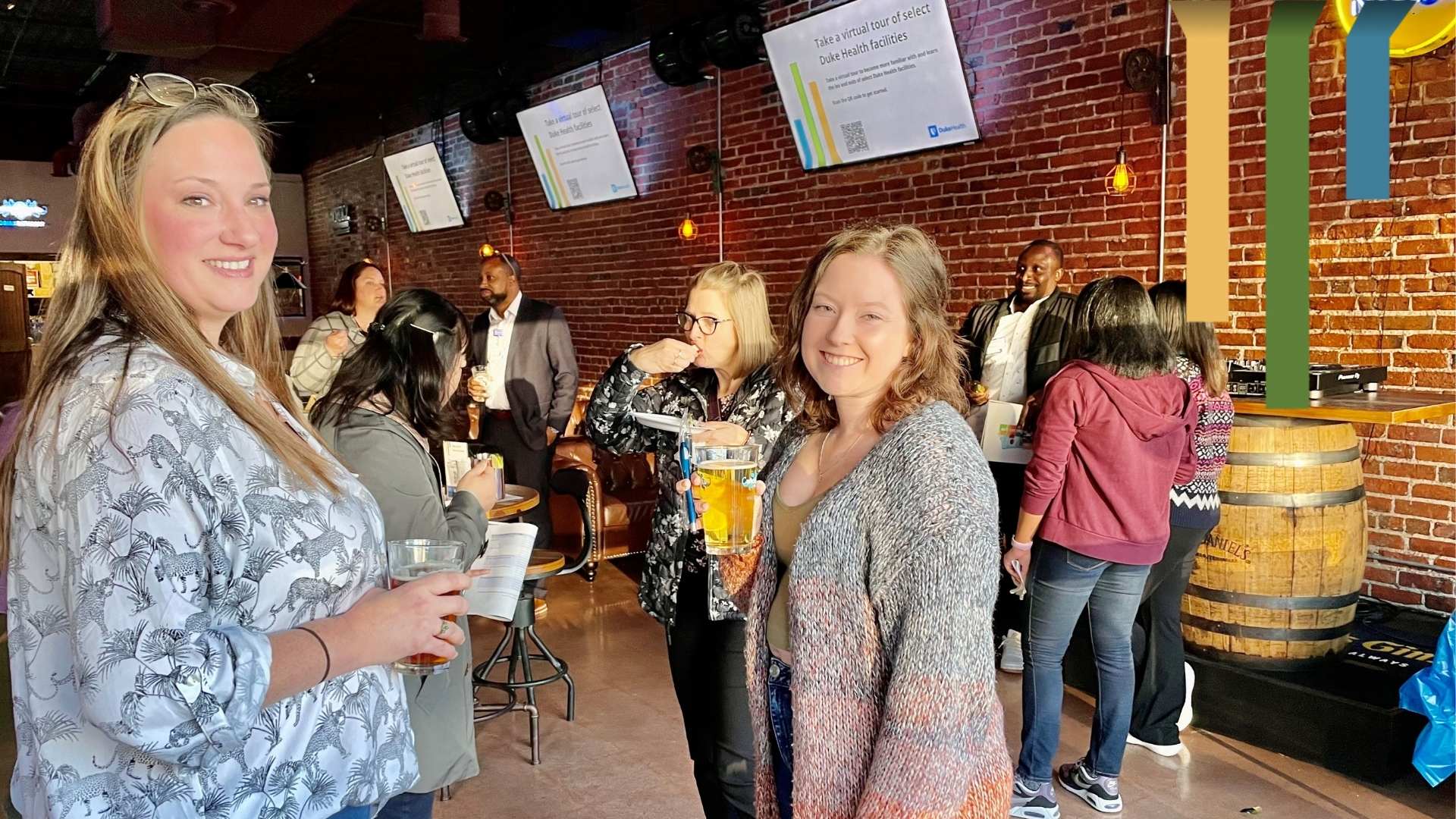 Team members gather during a New Talent Welcome Mixer.