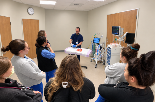 Students learn from experienced RT at a Duke Health facility.