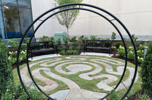 Labyrinth garden path and arch. 