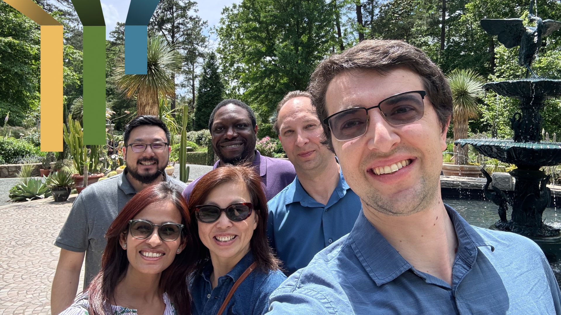 Team members take a selfie together in the Duke gardens.