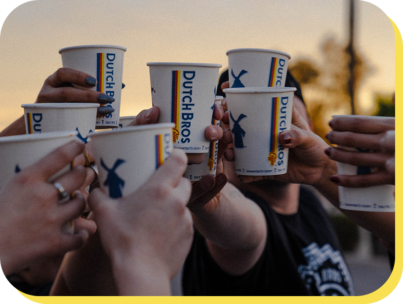 Cheers with Dutch Bros hot cups