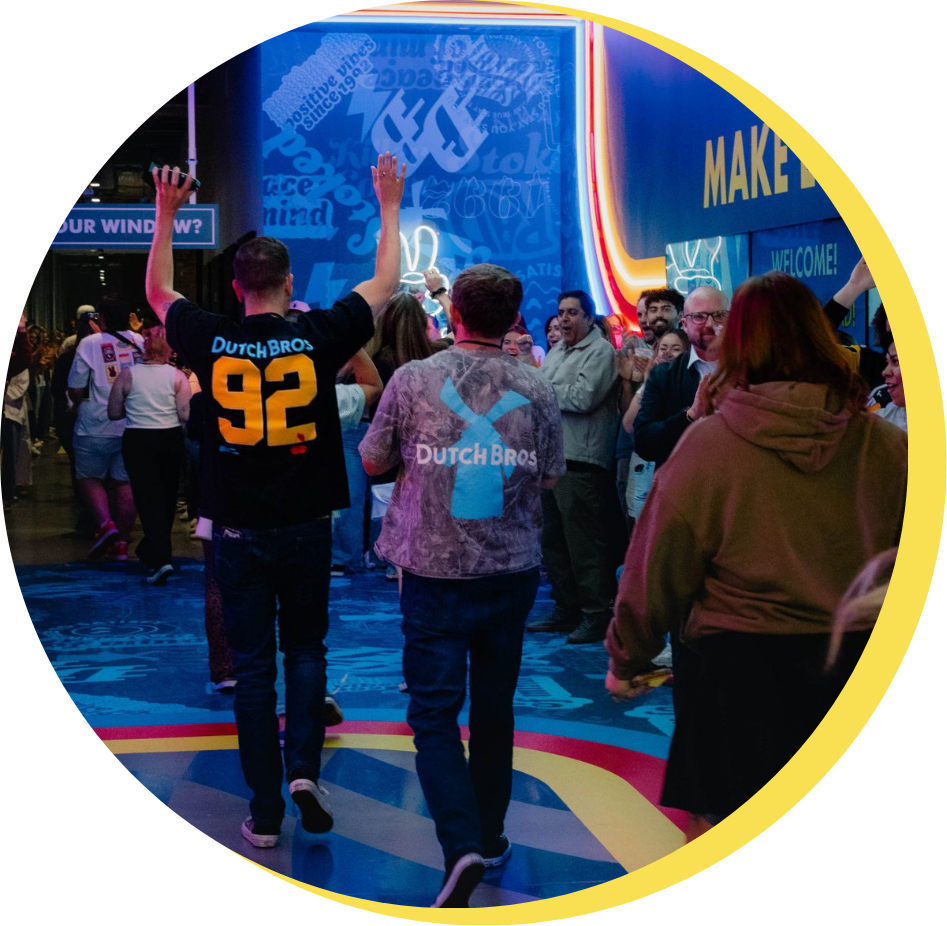 People cheering in the game day tunnel at HQ