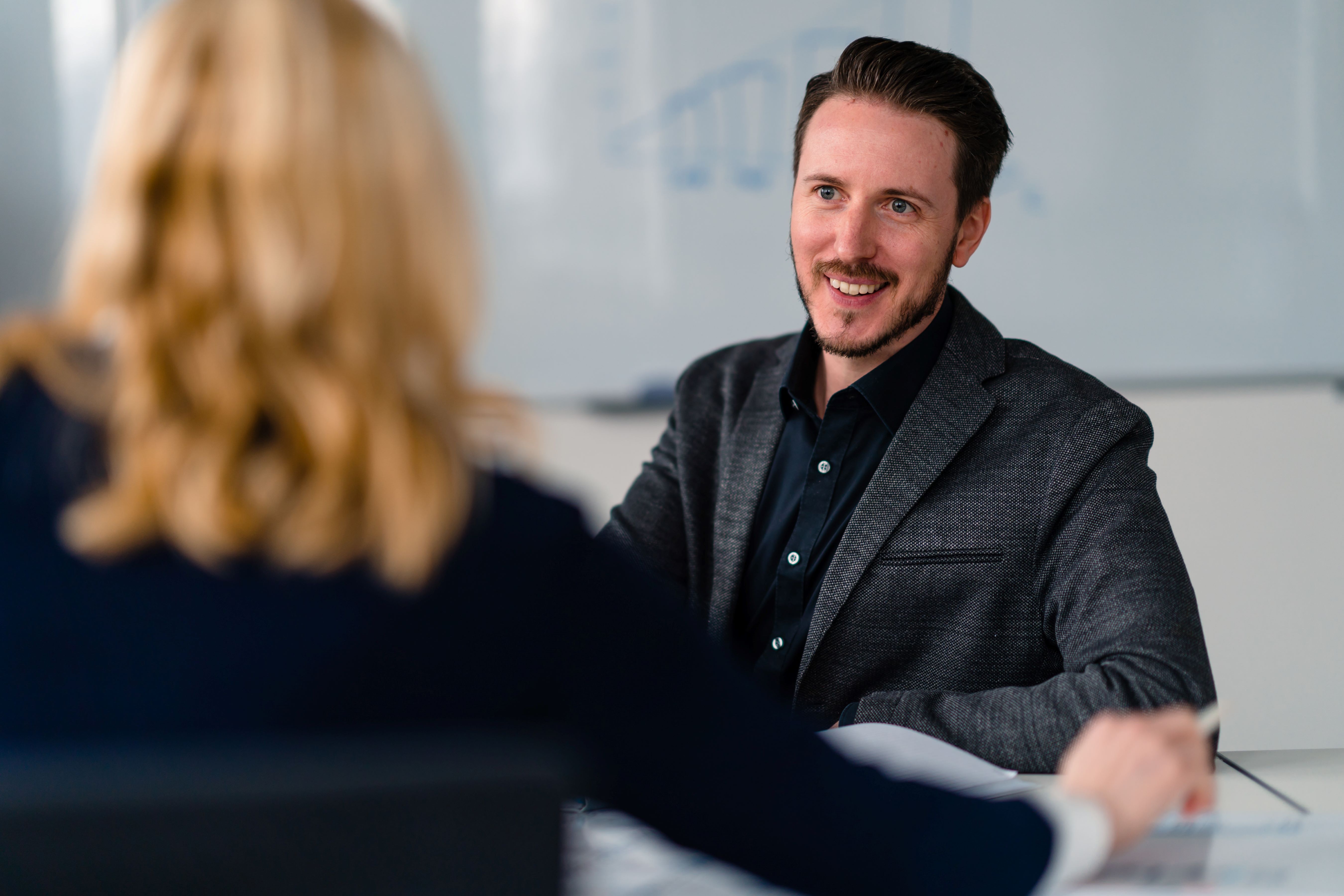 Two employees in dialogue