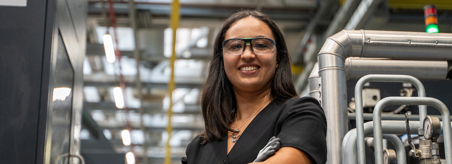 woman smiling in factory location