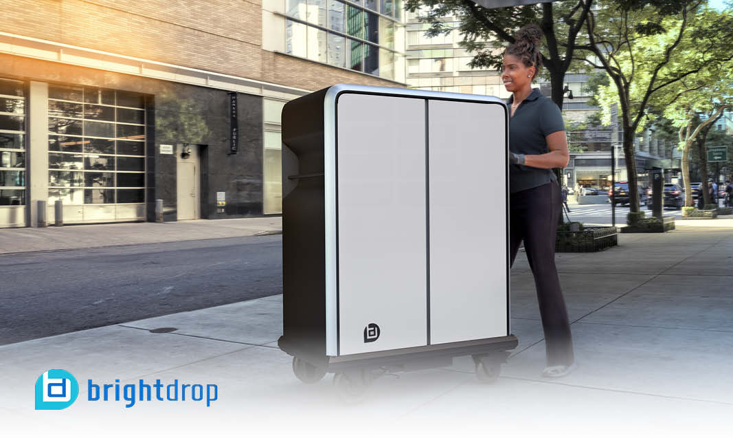 GM employees having a conversation at the Renaissance Center. 