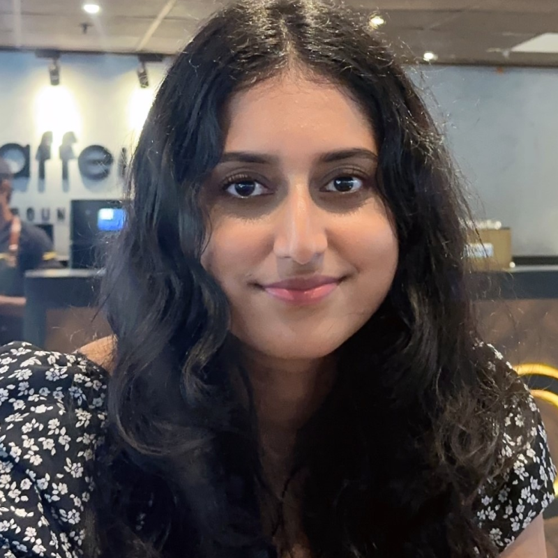 A young woman with long wavy dark hair