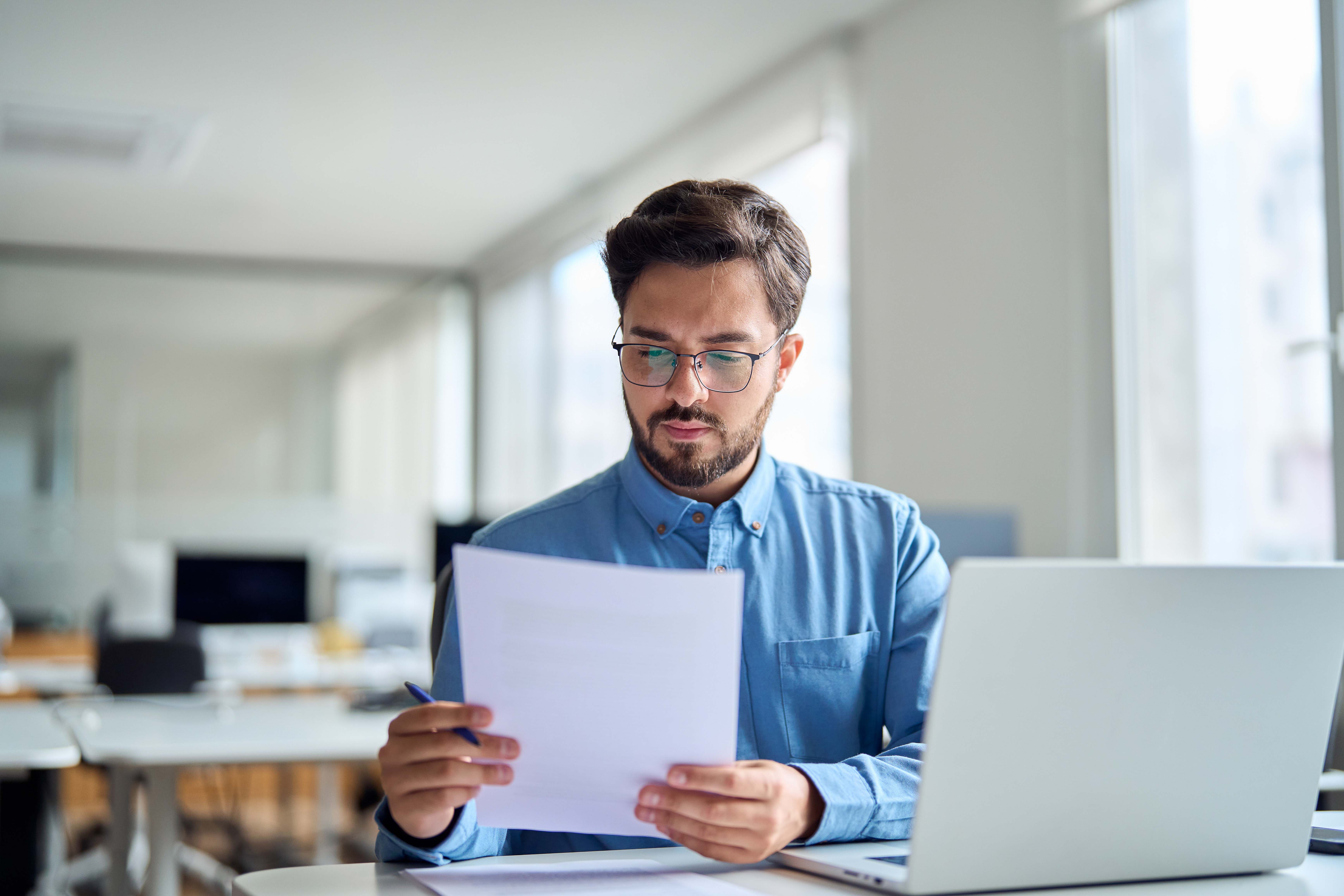 Employee looking at laptop
