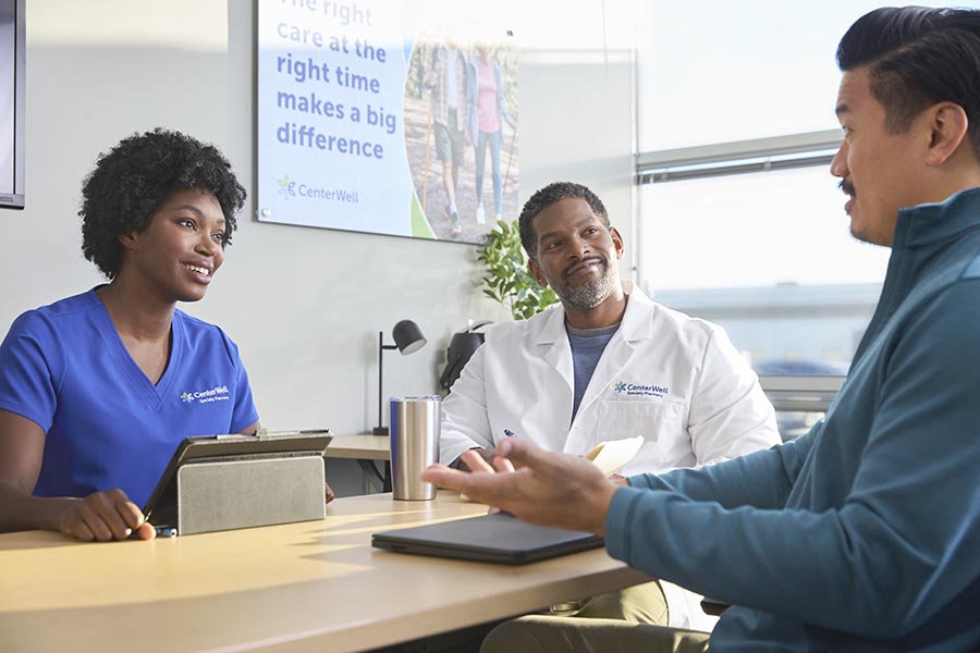 A group of pharmacists collaborating in a conference room 