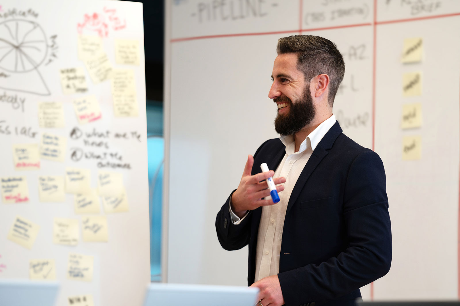 Male IAG employee giving a presentation